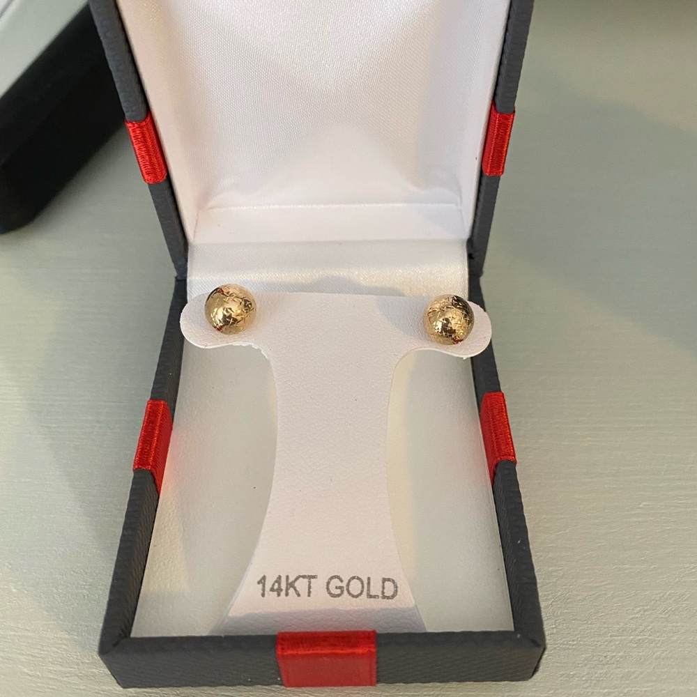 New in box - 14kt gold stud earrings, round with light texture